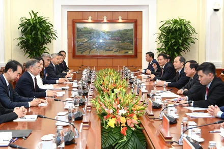 Trưởng Ban Tuyên giáo và Dân vận Trung ương Trịnh Văn Quyết hội đàm với Trưởng Ban Tuyên truyền Trung ương Đảng Cộng sản Trung Quốc Lý Thư Lỗi.