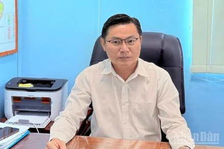 Ông Nguyễn Văn Mỹ, Chủ tịch Ủy ban nhân dân xã, Trưởng Ban Chỉ đạo thực hiện chính sách bảo hiểm xã hội và bảo hiểm y tế xã Hồ Đắc Kiện, thành phố Cần Thơ.