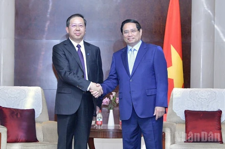 Thủ tướng Phạm Minh Chính và Chủ tịch Hội đồng quản trị Tập đoàn Khoa học công nghệ Hoa Điện Trung Quốc (CHEC) Bành Cương Bình. (Ảnh: THANH GIANG)