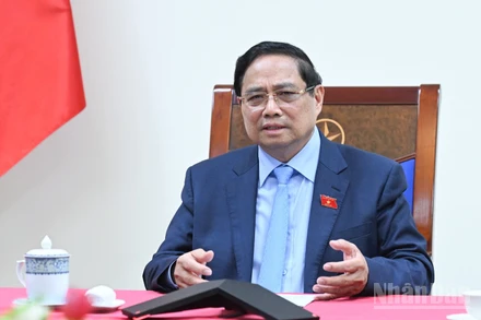 Thủ tướng Phạm Minh Chính điện đàm với Thủ tướng Thái Lan Anutin Charnvirakul. (Ảnh: Trần Hải)