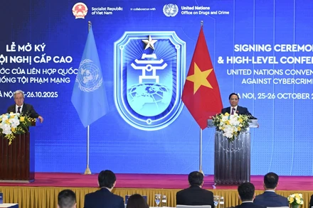 Thủ tướng Chính phủ Phạm Minh Chính cùng Tổng Thư ký Liên hợp quốc Antonio Guterres gặp gỡ báo chí tại Lễ mở ký và Hội nghị cấp cao Công ước của Liên hợp quốc về Chống tội phạm mạng.