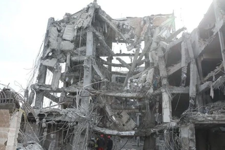 Những tòa nhà bị phá hủy sau các cuộc tấn công của Mỹ và Israel nhằm vào Tehran, Iran. (Ảnh: THX/TTXVN)