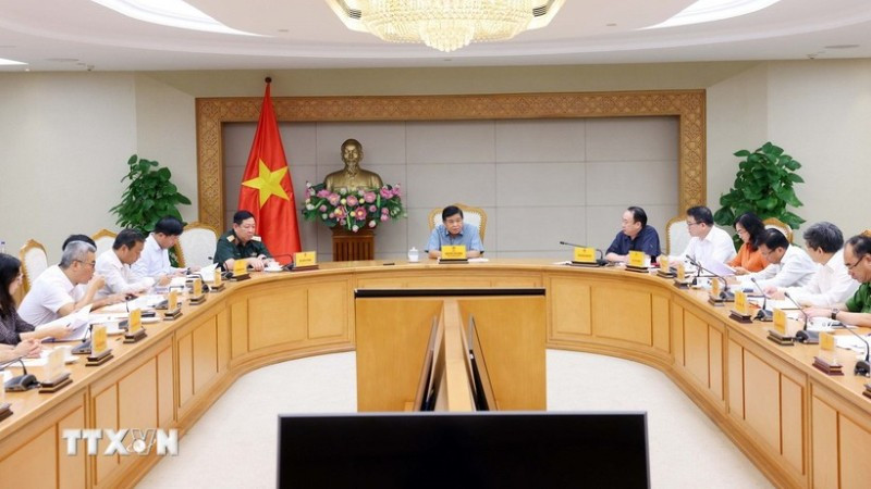 Quang cảnh cuộc họp về các dự án hợp tác Việt Nam-Lào. (Ảnh: PHẠM KIÊN/TTXVN)