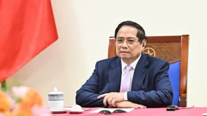 Thủ tướng Chính phủ Phạm Minh Chính điện đàm với Thủ tướng Malaysia Anwar Ibrahim. (Ảnh: Trần Hải)