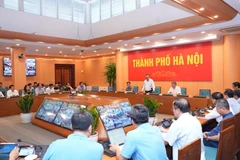 Chủ tịch Ủy ban nhân dân thành phố Hà Nội Trần Sỹ Thanh chủ trì cuộc họp các cơ quan, đơn vị để ứng phó với cơn bão số 11. (Ảnh: Linh Phạm)