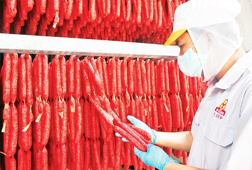 Lao động tại Công ty Vissan. (Ảnh: nhandan.vn)