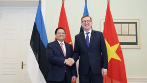 Thủ tướng Chính phủ Phạm Minh Chính và Thủ tướng Estonia Kristen Michal (Ảnh: Dương Giang/TTXVN).