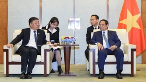 Chủ tịch Tập đoàn COMAC Shen Bo đề nghị phía Việt Nam tiếp tục tạo điều kiện cho việc khai thác tàu bay COMAC. (Ảnh: VGP/Nhật Bắc)