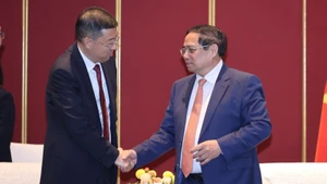 Thủ tướng Phạm Minh Chính tiếp ông Cát Hải Kiều, Chủ tịch Hội đồng Quản trị Ngân hàng Trung Quốc (BOC). Ảnh: VGP/Nhật Bắc