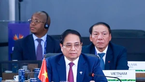 Thủ tướng Chính phủ Phạm Minh Chính phát biểu tại Phiên thảo luận cấp cao BRICS mở rộng về "Tăng cường chủ nghĩa đa phương, các vấn đề kinh tế-tài chính và trí tuệ nhân tạo". (Ảnh: VGP)