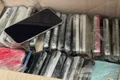 Tang vật là điện thoại thông minh nhãn hiệu iPhone đã qua sử dụng bị lực lượng chức năng thu giữ. (Ảnh: CHQ)