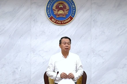 Thứ trưởng Tài chính Nguyễn Đức Chi chủ trì hội nghị.