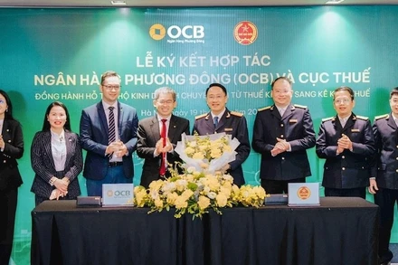 Quang cảnh Lễ ký kết hợp tác. (Ảnh KỲ DUYÊN)