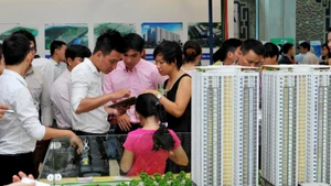 Doanh nghiệp trong lĩnh vực bất động sản, xây dựng có hệ số nợ cao khó có thể được phát hành trái phiếu. Ảnh: NAM ANH