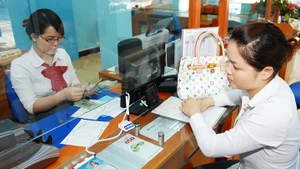 Xuất hiện của loại hình P2P Lending tạo ra sự linh hoạt, thuận tiện giúp nhiều người có cơ hội vay tiền. Ảnh: NAM ANH