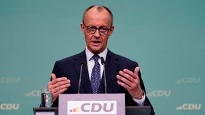 Ông Friedrich Merz trong cuộc họp báo sau khi giành chiến thắng.
