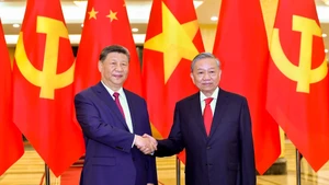 Tổng Bí thư Tô Lâm với Tổng Bí thư, Chủ tịch Trung Quốc Tập Cận Bình. Ảnh: ĐĂNG KHOA
