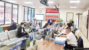 Bộ phận giao dịch một cửa tại quận Đống Đa, Hà Nội. (Ảnh nhandan.vn)