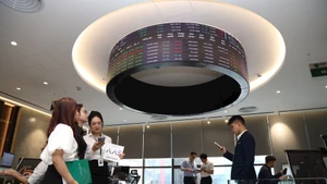 Đã đến lúc để Việt Nam sẵn sàng hội nhập sâu rộng hơn với kinh tế toàn cầu thông qua phát triển tài sản mã hóa. Ảnh: Minh Dũng - Thiết kế: Lê Minh