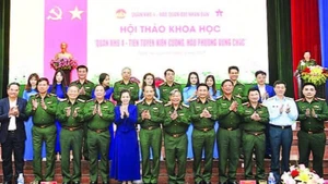 Các đại biểu dự hội thảo khoa học "Quân khu 4 - Tiền tuyến kiên cường, hậu phương vững chắc". (Ảnh TUẤN HUY)