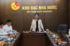 Phó Giám đốc Kho bạc Nhà nước Ngô Thị Nhung thông tin với báo chí về kết quả hoạt động của Kho bạc Nhà nước năm 2025, định hướng năm 2026.