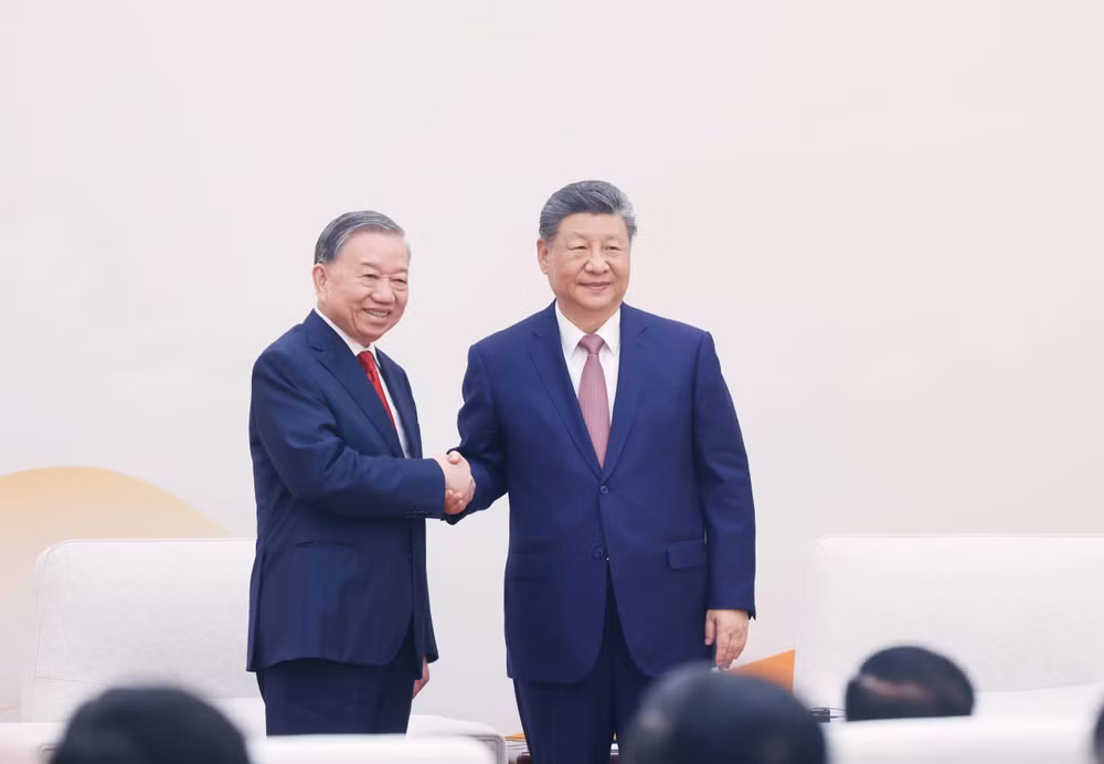 vna-potal-tong-bi-thu-chu-tich-nuoc-to-lam-va-tong-bi-thu-chu-tich-nuoc-tap-can-binh-gap-go-thanh-nien-hai-nuoc-8702389.jpg