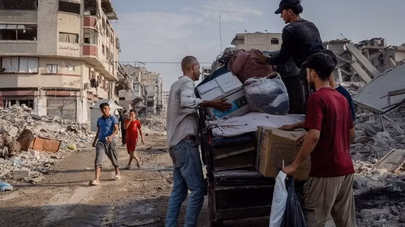 Người dân ở Gaza trở về nhà sau khi lệnh ngừng bắn có hiệu lực. (Ảnh WEF)