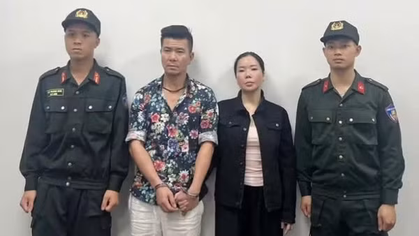 Bị can Nguyễn Thị Mai Anh và Lê Văn Đông. (Ảnh: Bộ Công an)