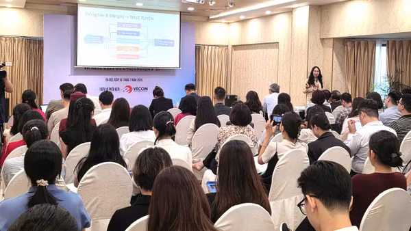 Hội nghị giới thiệu những điểm mới của Luật Thương mại điện tử và các văn bản hướng dẫn thi hành. (Ảnh: KIM DUNG)