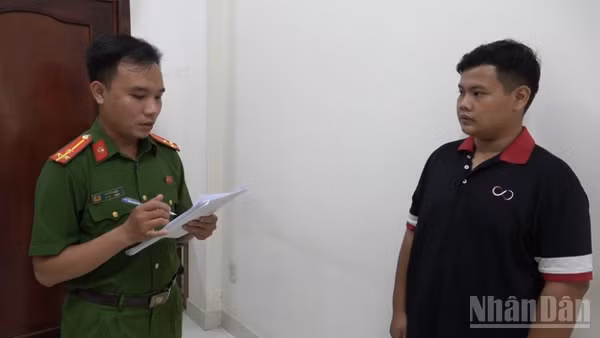Đối tượng Huỳnh Quốc Lợi làm việc với cơ quan Công an.