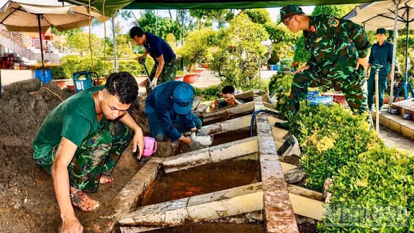 Các lực lượng làm nhiệm vụ tại Nghĩa trang Liệt sĩ Lai Vung-Lấp Vò (tỉnh Đồng Tháp). 