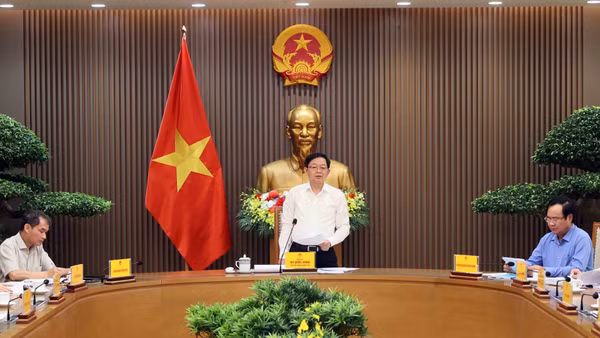 Phó Thủ tướng Hồ Quốc Dũng chủ trì cuộc họp về tình hình xử lý kiến nghị, khó khăn, vướng mắc của doanh nghiệp - Ảnh: TTXVN