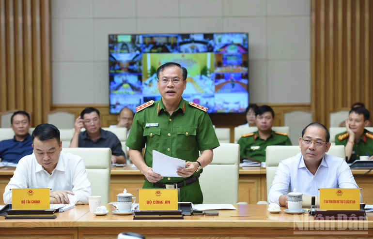Đại diện lãnh đạo Bộ Công an phát biểu tại Hội nghị. (Ảnh: TRẦN HẢI) ndo_br_a6-3066.jpg
