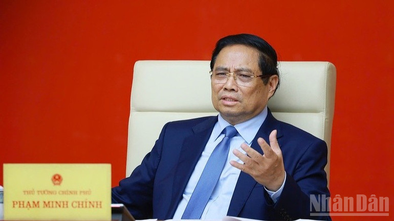 Thủ tướng Phạm Minh Chính phát biểu ý kiến kết luận cuộc họp. (Ảnh: TRẦN HẢI) ndo_br_c2-9035.jpg
