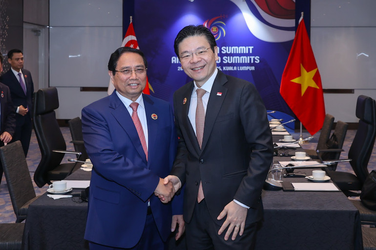 Thủ tướng Chính phủ Phạm Minh Chính và Thủ tướng Singapore Lawrence Wong họp thường niên lần thứ 2. (Ảnh: VGP/Nhật Bắc) s1.jpg