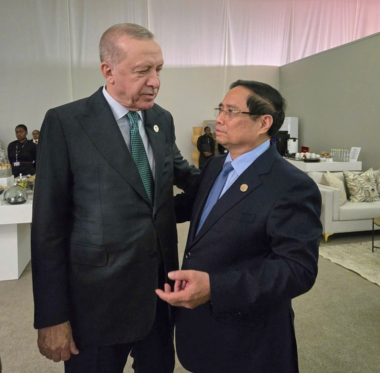 Premiärminister Pham Minh Chinh och Turkiets president Recep Tayyip Erdoğan. (Foto: VGP/Nhat Bac) tho.jpg