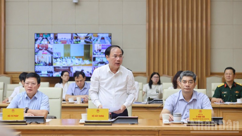 Lãnh đạo Bộ Xây dựng báo cáo tại Hội nghị (Ảnh: Trần Hải). ndo_br_a4-1598.jpg