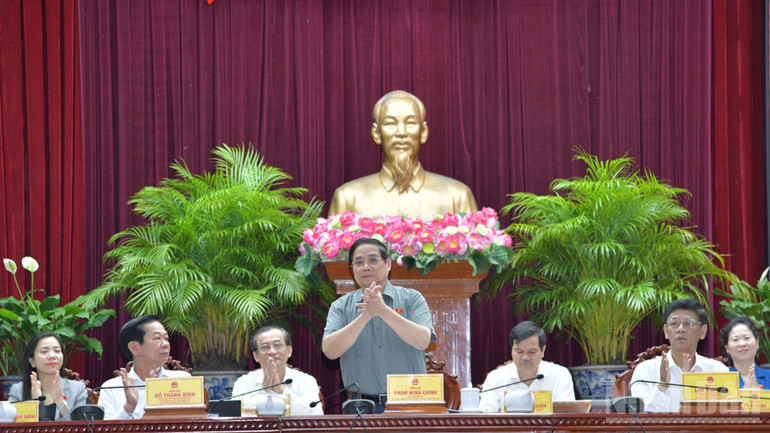 Thủ tướng Phạm Minh Chính chủ trì Hội nghị tiếp xúc cử tri trước Kỳ họp thứ 10, Quốc hội khóa XV tại thành phố Cần Thơ. (Ảnh: Thanh Giang) ndo_br_a2-5024.jpg