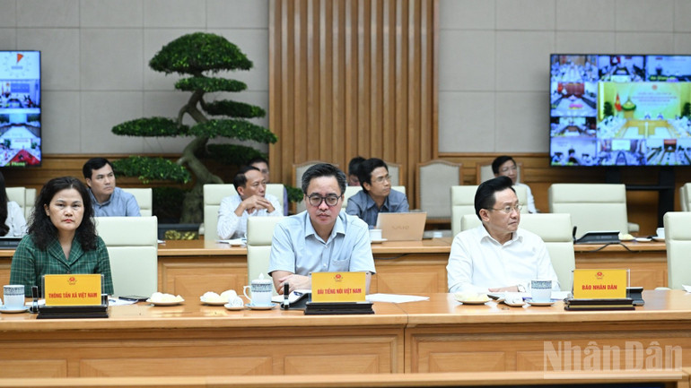 Lãnh đạo các cơ quan thông tấn, báo chí chủ chốt, các đại biểu tham dự phiên họp. (Ảnh: TRẦN HẢI) ndo_br_a6-904-7394.jpg