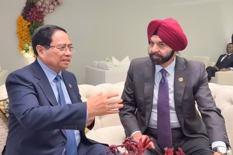Premiärminister Pham Minh Chinh och Världsbankens president Ajay Banga. (Foto: VGP) wb.jpg