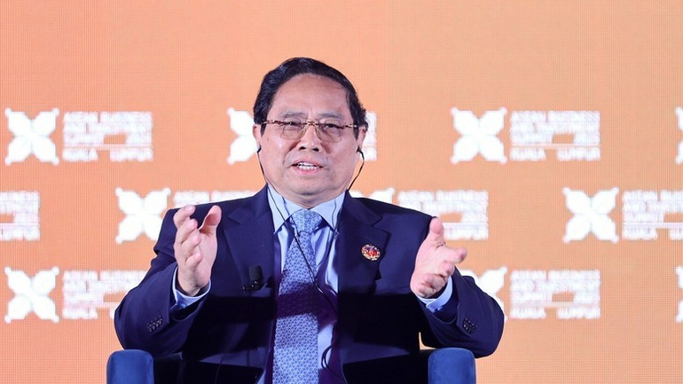Premiärminister Pham Minh Chinh presenterade Vietnams viktigaste ekonomiska prioriteringar framöver vid högnivådialogen. (Foto: Nhat Bac/VGP) c3-681.jpg