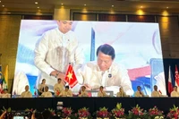 Đại tướng Lương Tam Quang, Ủy viên Bộ Chính trị, Bộ trưởng Công an Việt Nam tại lễ ký kết. 