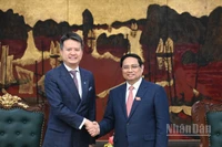 Thủ tướng Phạm Minh Chính và Tổng Giám đốc Tổ chức Sở hữu trí tuệ Thế giới (WIPO) Daren Tang. (Ảnh: Trần Hải)