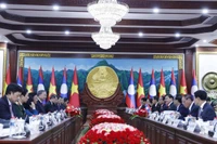 Tổng Bí thư Tô Lâm hội đàm với Tổng Bí thư, Chủ tịch nước Lào Thongloun Sisoulith. (Ảnh: Thống Nhất/TTXVN)