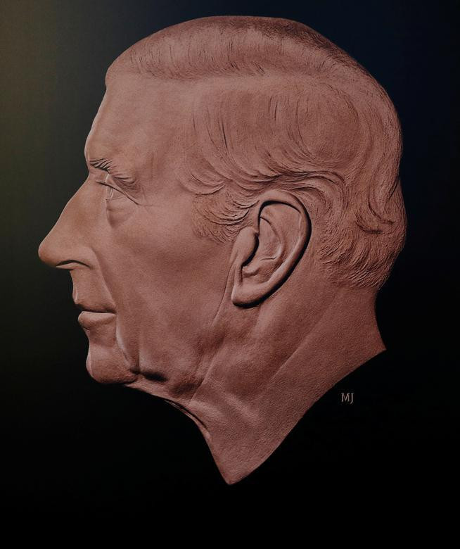 Chân dung Vua Charles III được in trên đồng xu. (Ảnh: REUTERS)