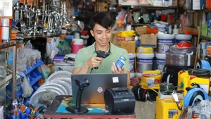 Vietcombank hỗ trợ hộ kinh doanh chuyển đổi số theo Nghị định 70