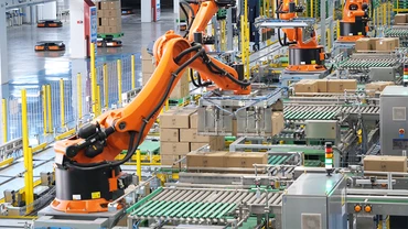 Robot bốc xếp sản phẩm sữa tươi của Tập đoàn Yili, khu tự trị Nội Mông, Trung Quốc. (Ảnh: HỒ QUÂN)