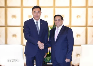 Thủ tướng Phạm Minh Chính tiếp ông Tôn Vinh Côn, Chủ tịch Công ty Đầu máy toa xe Đại Liên. 