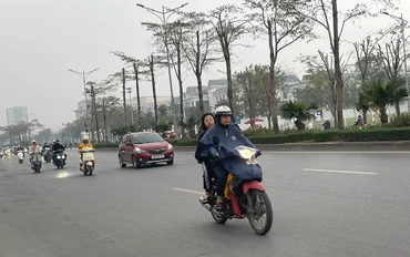 Hà Nội trời rét đậm và có mưa phùn. Ảnh: ĐT