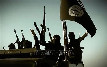 Các tay súng IS tại một địa điểm bí mật ở tỉnh Anbar, Syria, ngày 17/3/2014. (Ảnh minh họa: AFP/TTXVN)